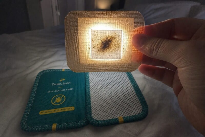 Customer checking a CaptureCard with phone light
