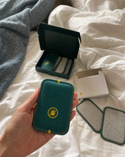 Customer unboxing CaptureCards near bed