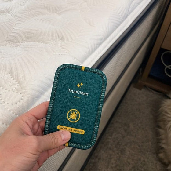 Customer holding CaptureCards near mattress