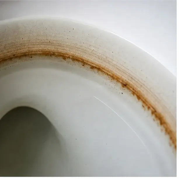thumbnail — close-up of the waterline ring forming again on porcelain, time-lapse style.